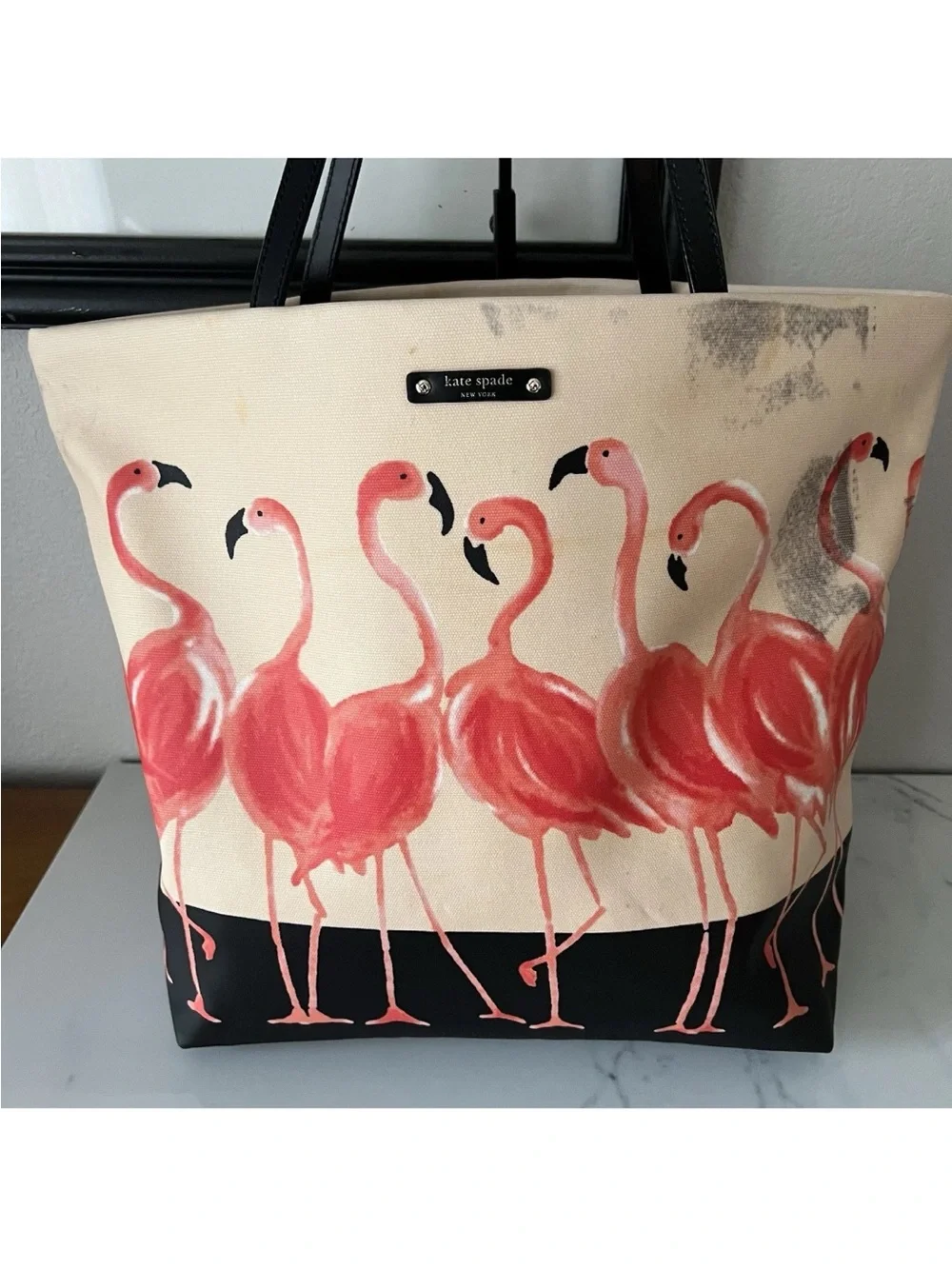 Canvas Flamingo Tote Bag with Black Trim see all pictures. It has black marks.